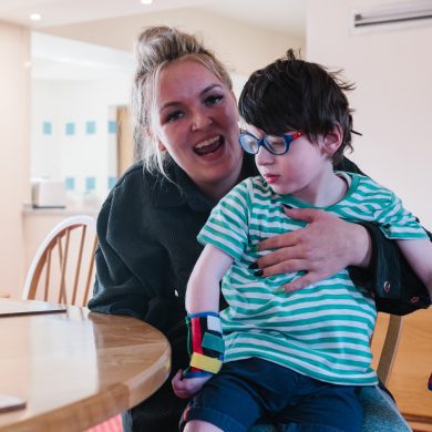 Laura and Henry in the lounge at Francis House