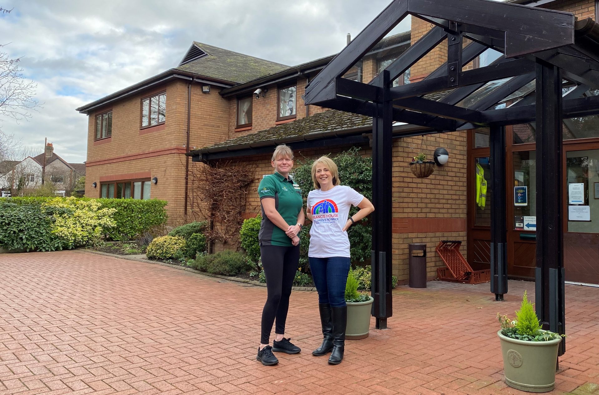 Morrisons staff with Francis House staff stood outside Francis House