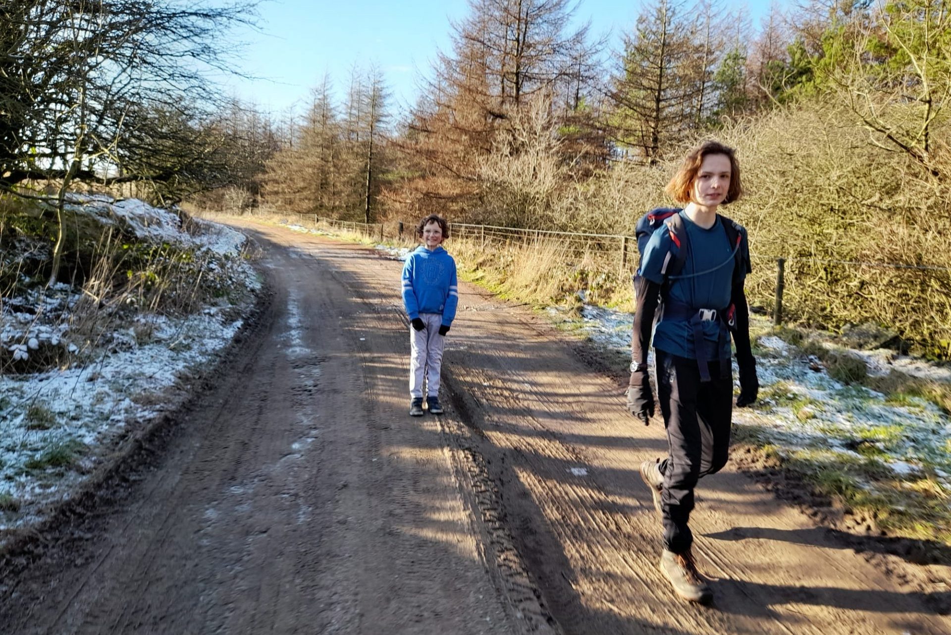 Two boys walking in the countryside