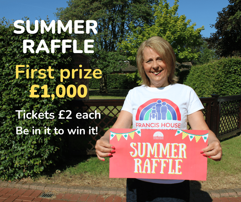 Woman wearing a white t-shirt with a rainbow logo holding a banner with the words summer raffle. Caption reads First prize £1000