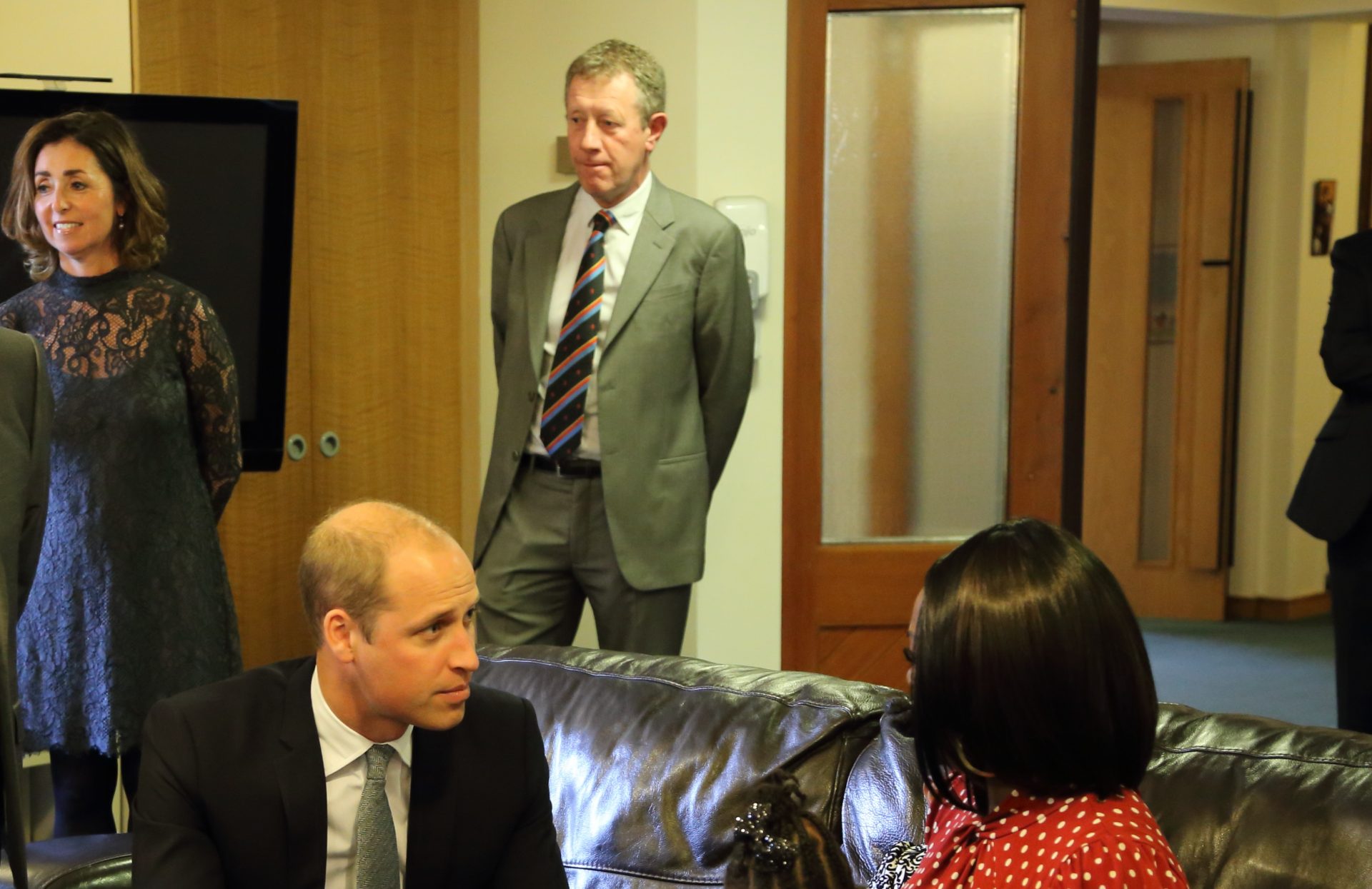 Dr David Dawson stood behind the Duke of Cambridge at Francis House