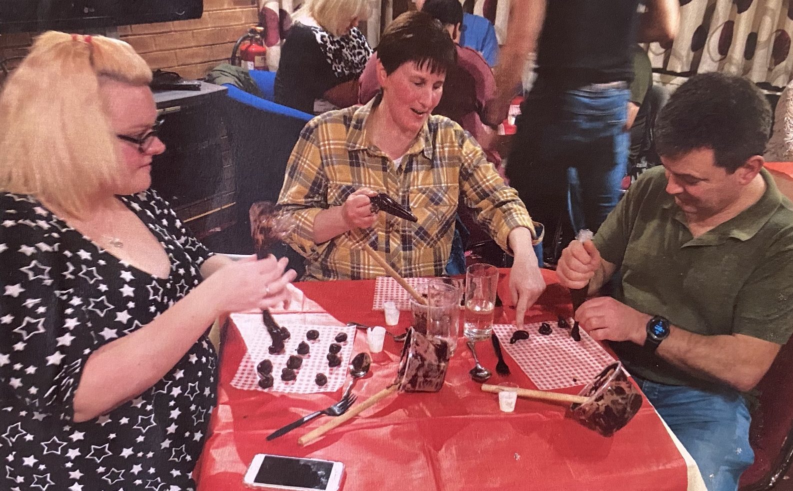 Parents making chocolates at Francis House