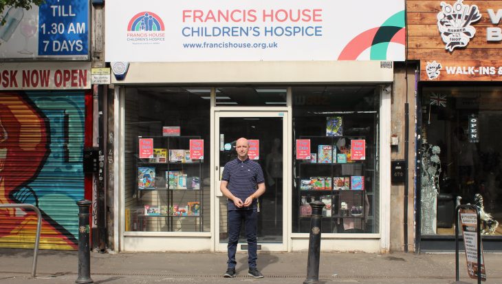 Jason Connor stood outside the Francis House chartity shop