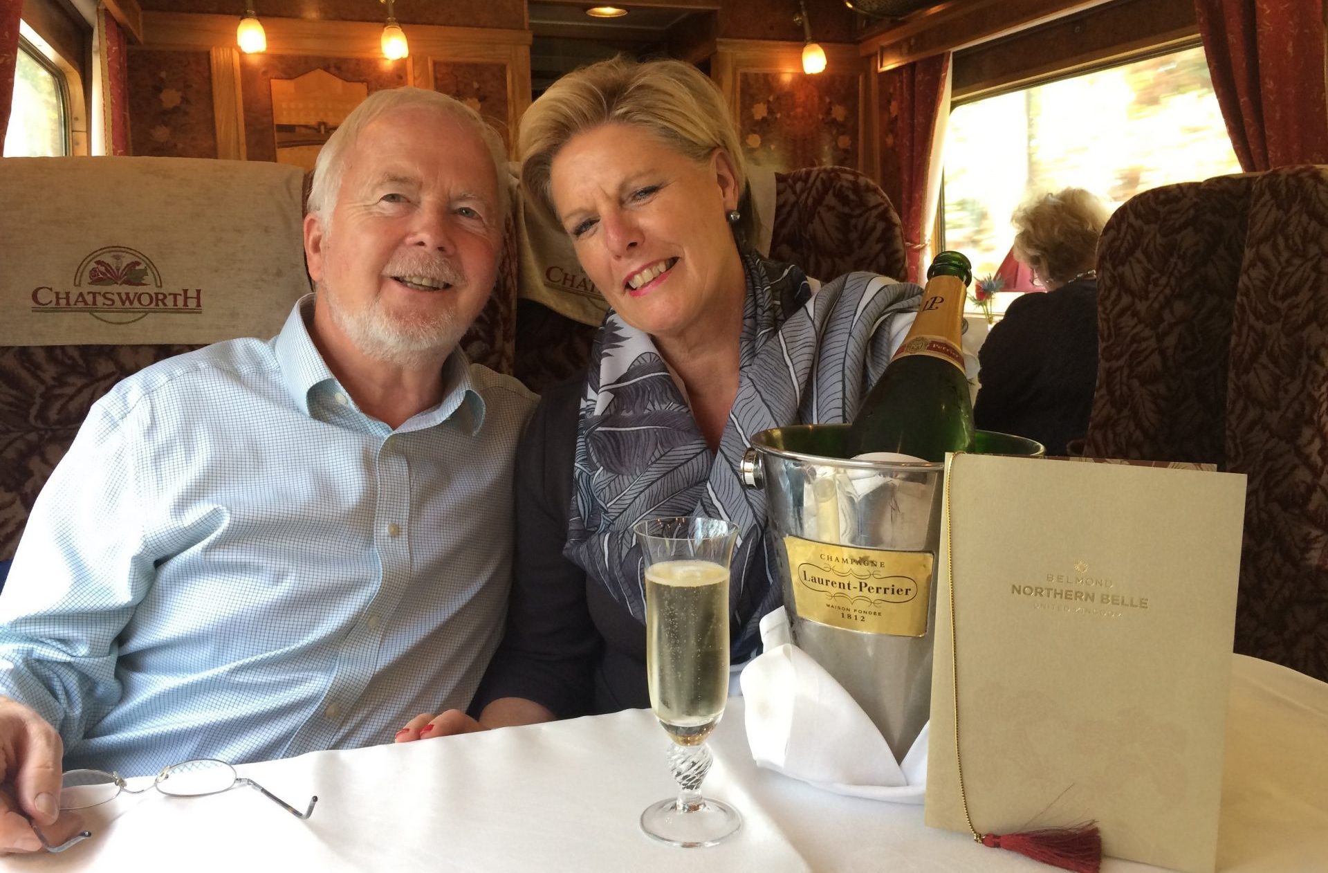 Graham Baxendale with Carole Geary on a train