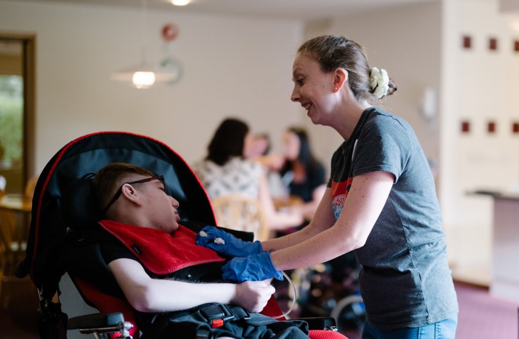 Nurse with young person in Francis Lodge