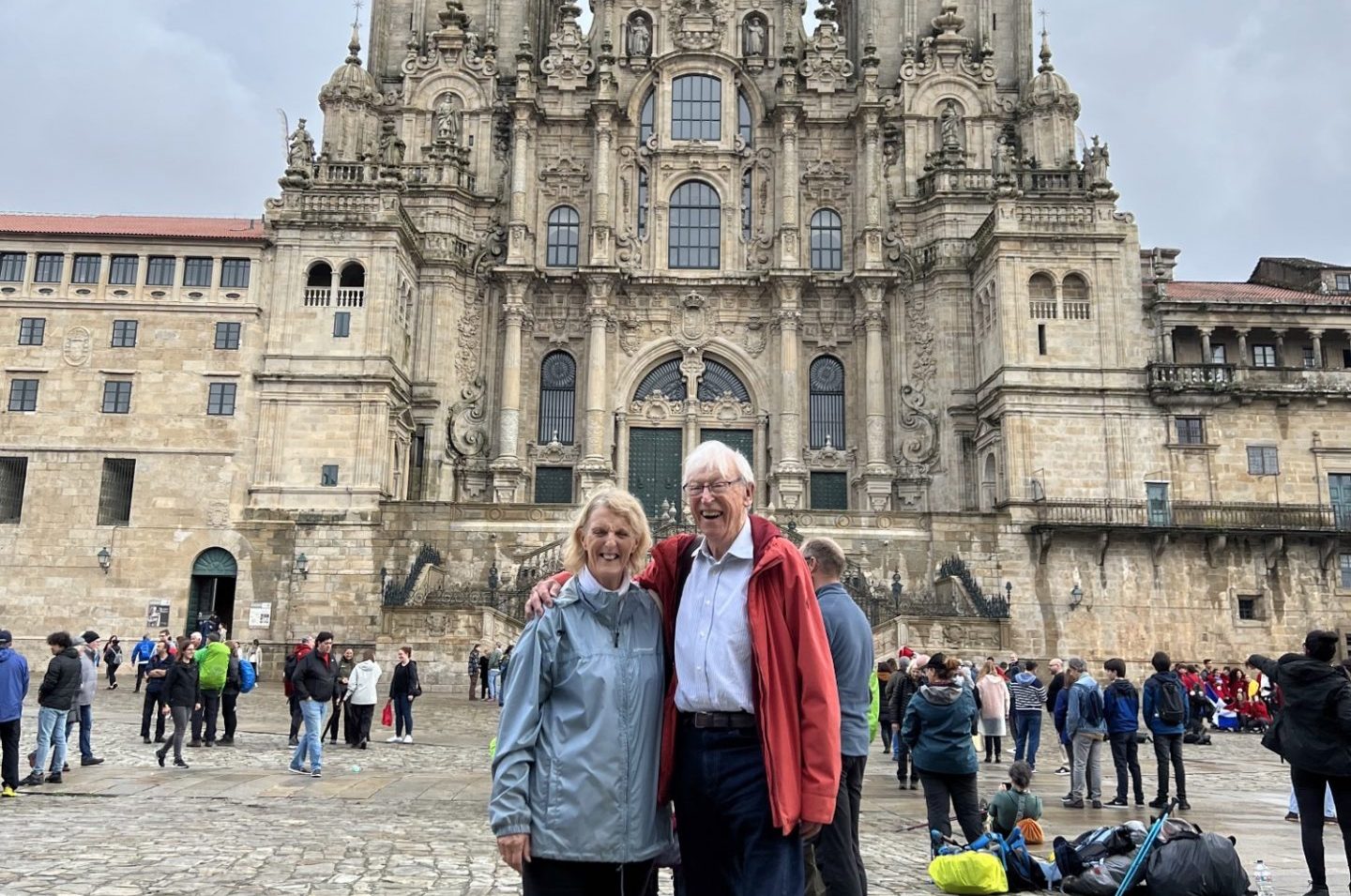 Woman and Man stood in front of cathedral