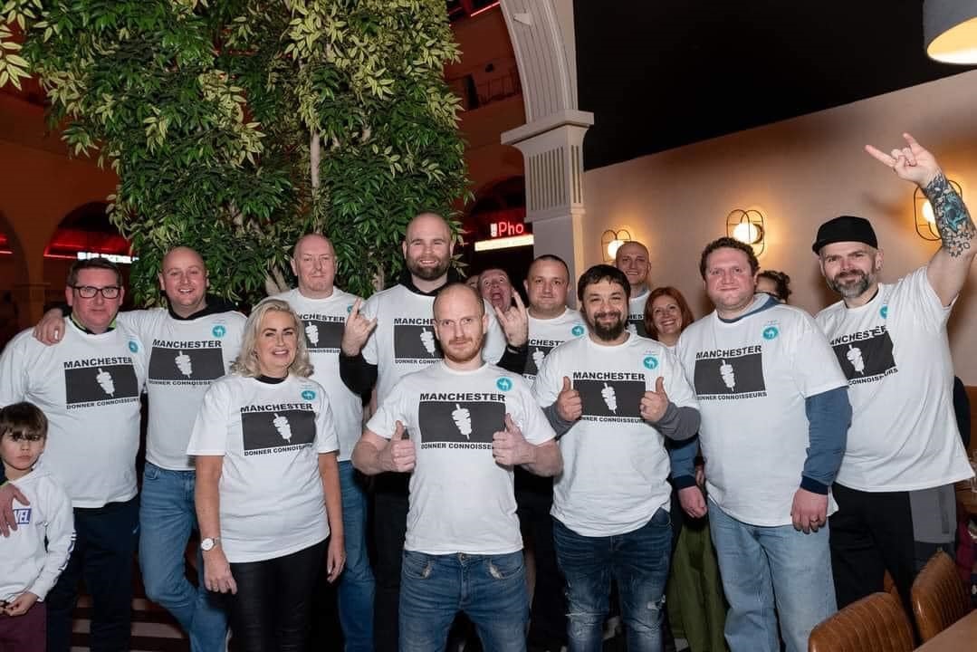 Group of people wearing similar t-shirts