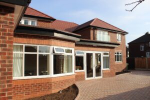 View of back of house with paved garden area