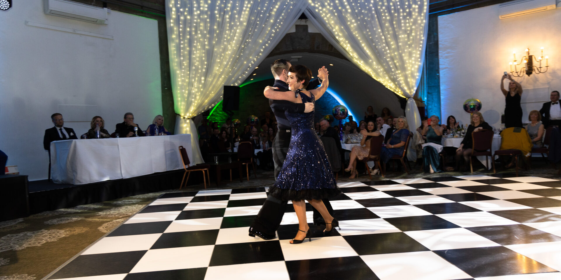 Two dancers on a dance floor