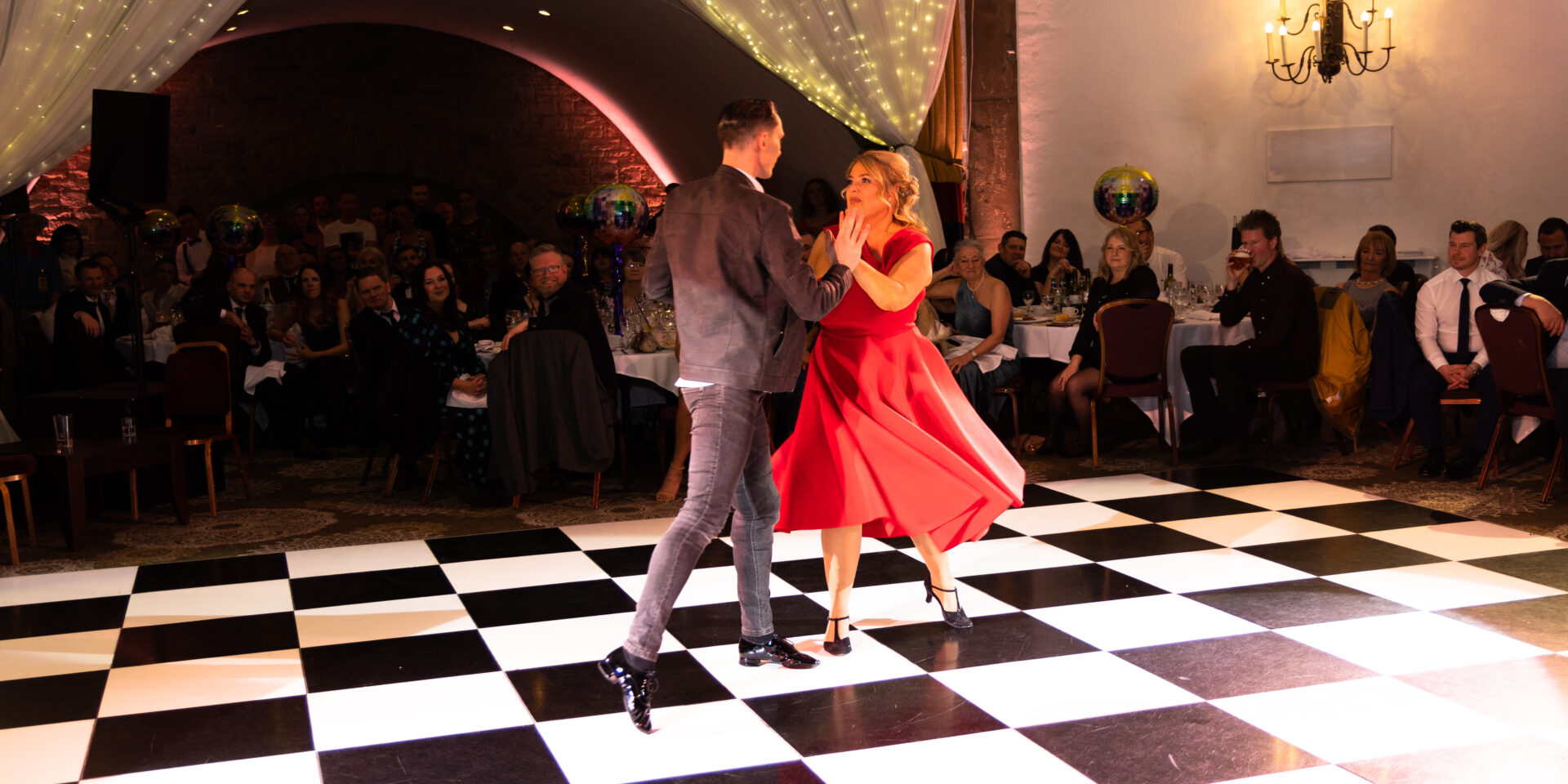 Two dancers on a dance floor