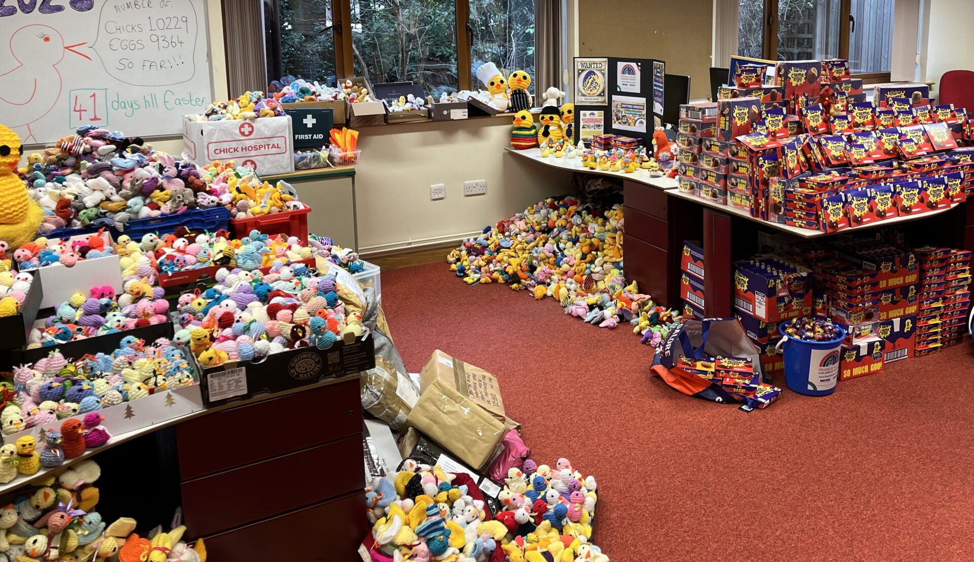 Office filled with knitted chicks and chocolate eggs