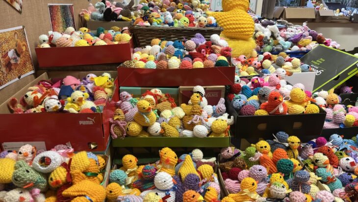 Boxes filled with knitted chicks