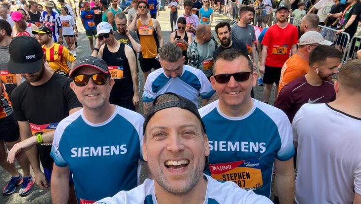 Group of runners at the start of the Great Manchester Run race