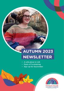 Cover of a newsletter with a smiling girl wearing a colourful jumper sat in a wheelchair on a terrace
