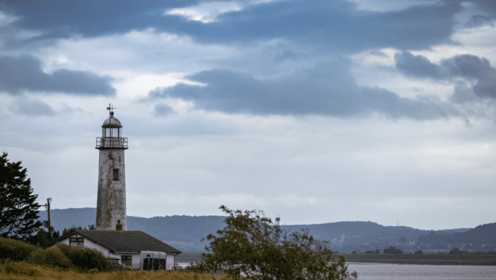 A photograph of the Hale Village lighthouse on the Mersey estuary, where the walk begins