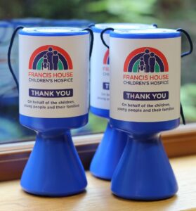 Blue charity collection tins